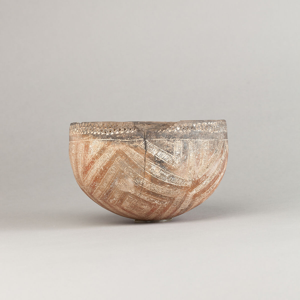 Drinking Cup, Polished black ware with decoration filled with white pigment