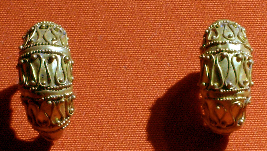 Pair of boat-shaped earrings with filigree and granule decoration