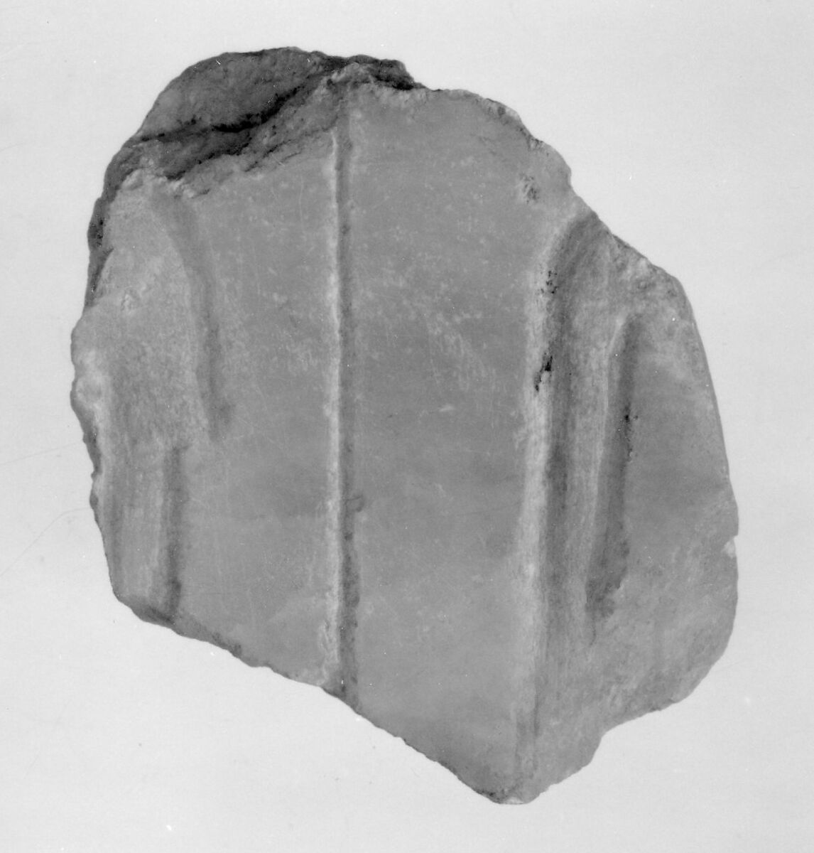 Decorated fragment from the side of a canopic chest, Travertine (Egyptian alabaster) 