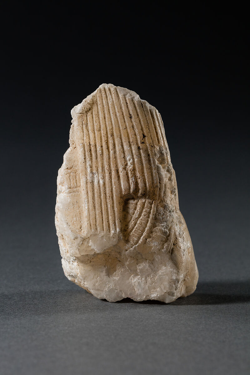 Fragment of the Corner of a Canopic Chest, Travertine (Egyptian alabaster) 