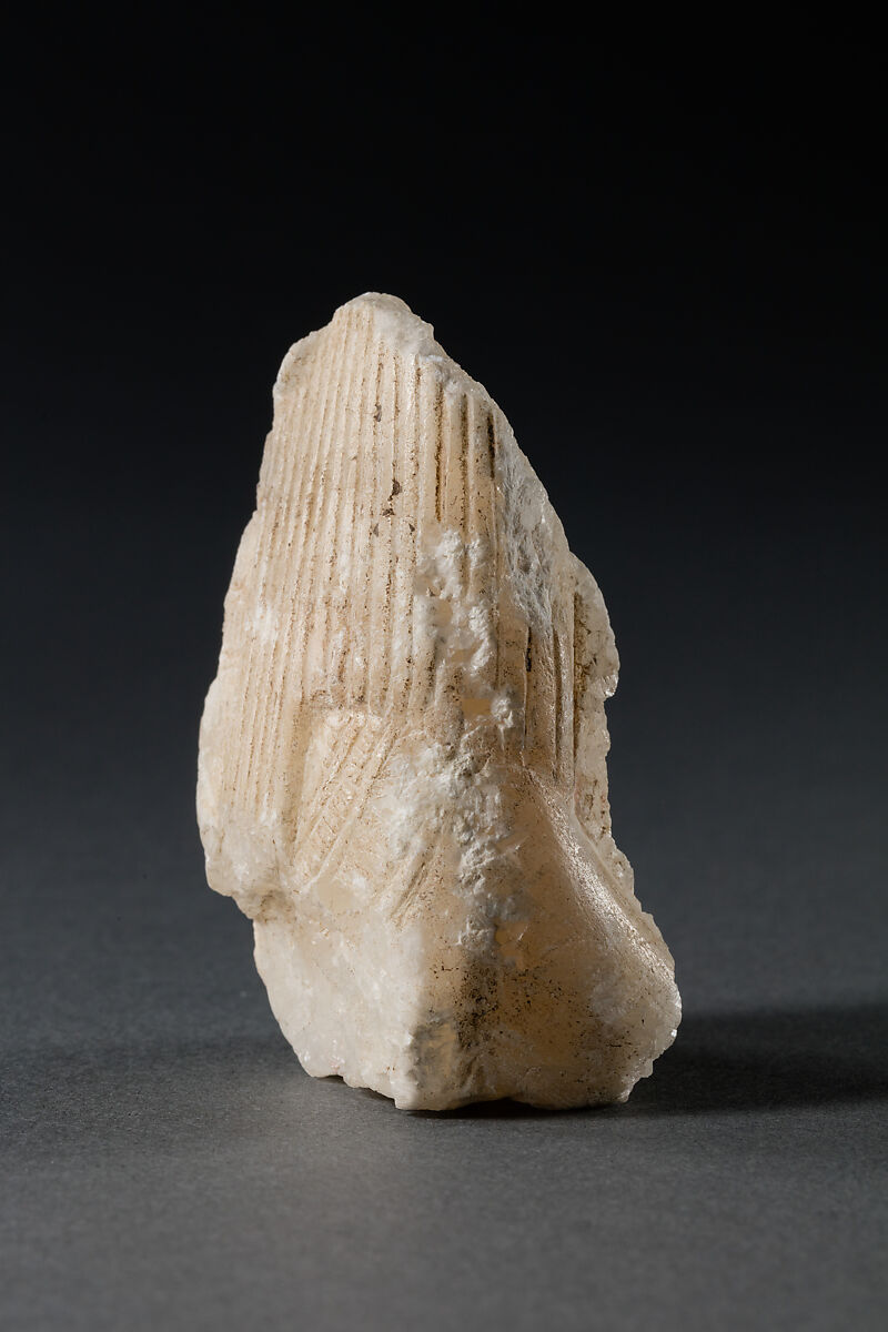 Fragment of the Corner of a Canopic Chest, Travertine (Egyptian alabaster)