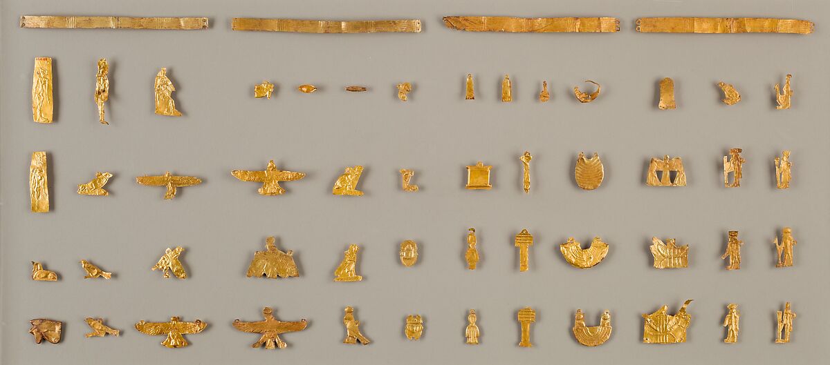 Amulet depicting two baboons flanking a djed pillar with sundisk and atef-crown, Gold sheet