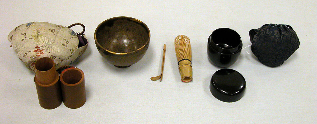 Teabowl and Accessories, Clay, transparent glaze and thick overglaze in spots; accessories consist of black lacquer tea jar, small cylindrical wooden holder with bamboo tea whisk and jointed bamboo spoon; brocade covers for bowl and tea jar; these form a set for a traveler (Karatsu ware), Japan 