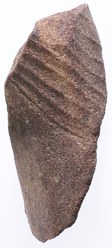 Section of the left leg from a small striding statue