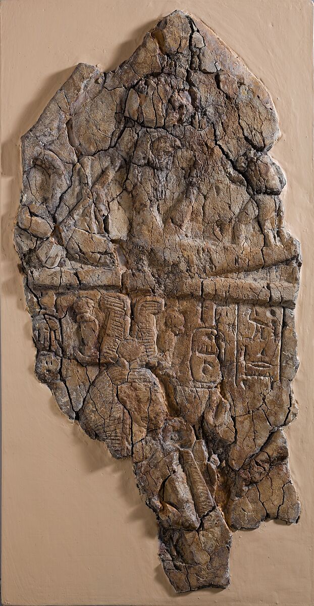 Fragment of Stela depicting a figure labeled 'excellent spirit of Re'  facing Ramesses I and  Ahmose-Nefertari beneath the barque of Re, limestone
