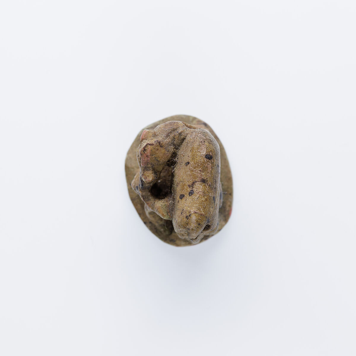 Design amulet, Cow and Calf on the Back, Device showing Antithetical Falcons Flanking an Ankh Sign over a Crouching Lion, Steatite