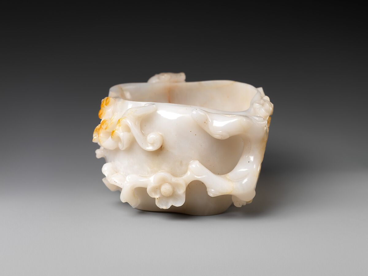 Brush washer with plum blossoms and feline dragons, Chalcedony, China
