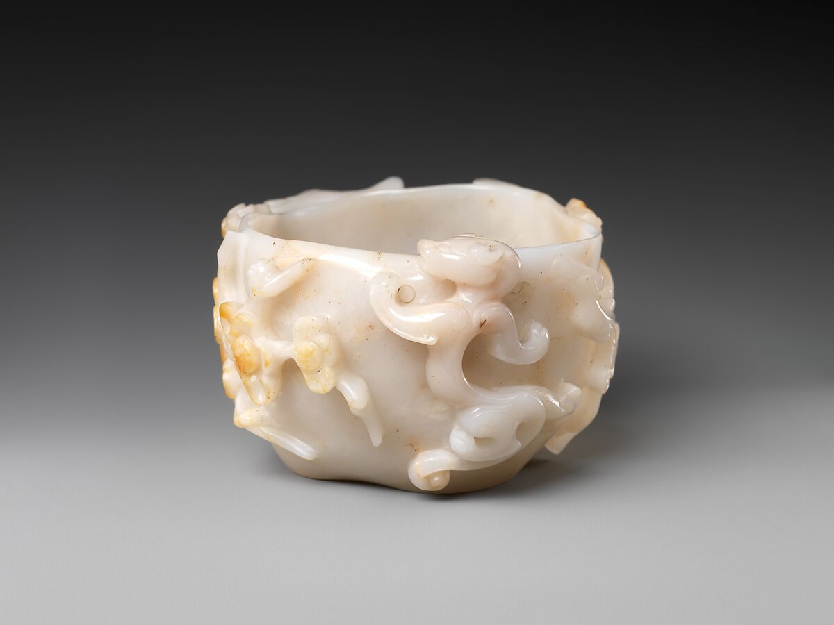 Brush washer with plum blossoms and feline dragons, Chalcedony, China