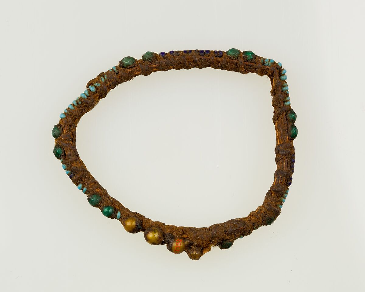 Bracelet of beads strung on fiber, Glass, palm fiber 