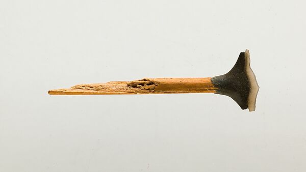 Transverse arrowhead hafted on an arrow fragment