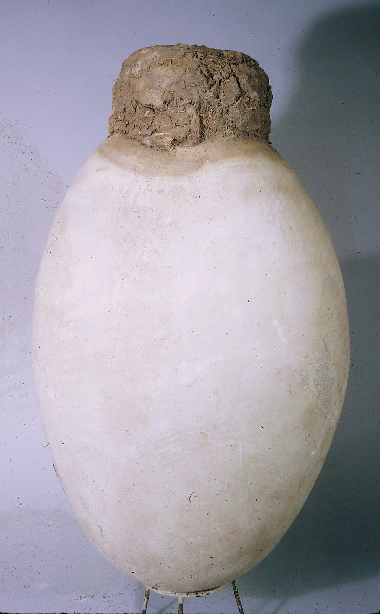 Jar containing mummifying materials, Pottery, clay stopper 