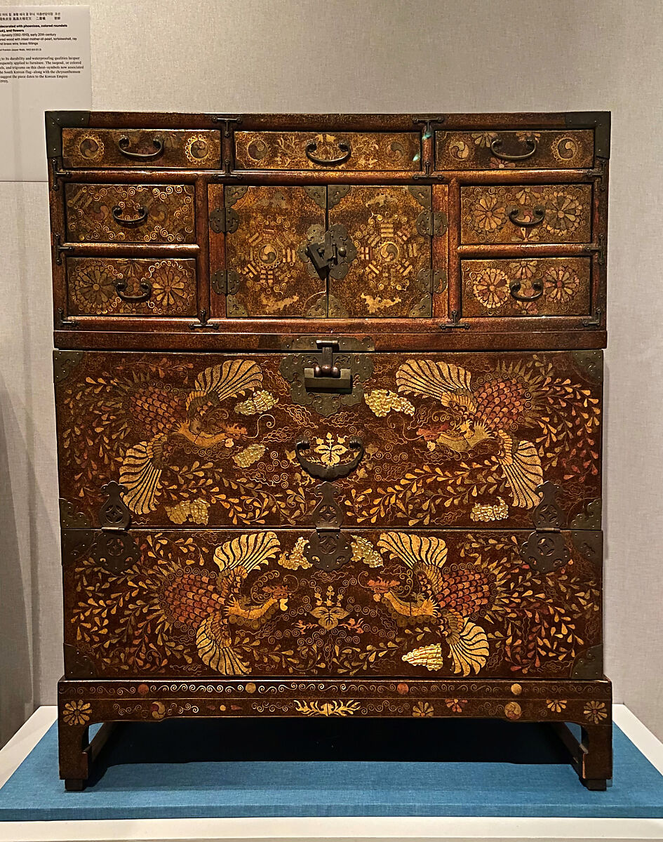 Chest decorated with phoenixes, colored roundels (taegeuk), and flowers, Lacquered wood with inlaid mother-of-pearl, tortoiseshell, ray skin, and brass wire; brass fittings, Korea 