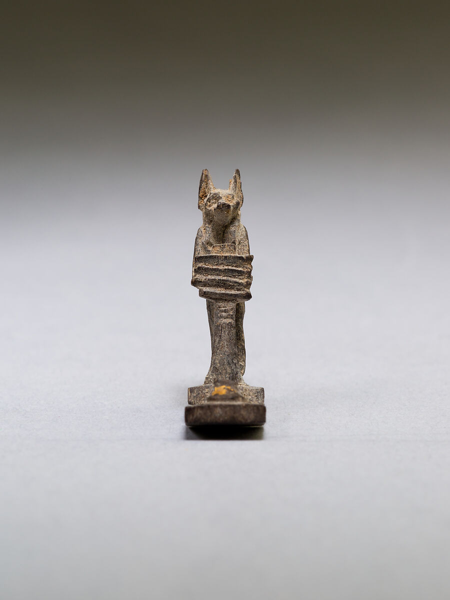 Anubis (?) supporting a large djed pillar, wood 