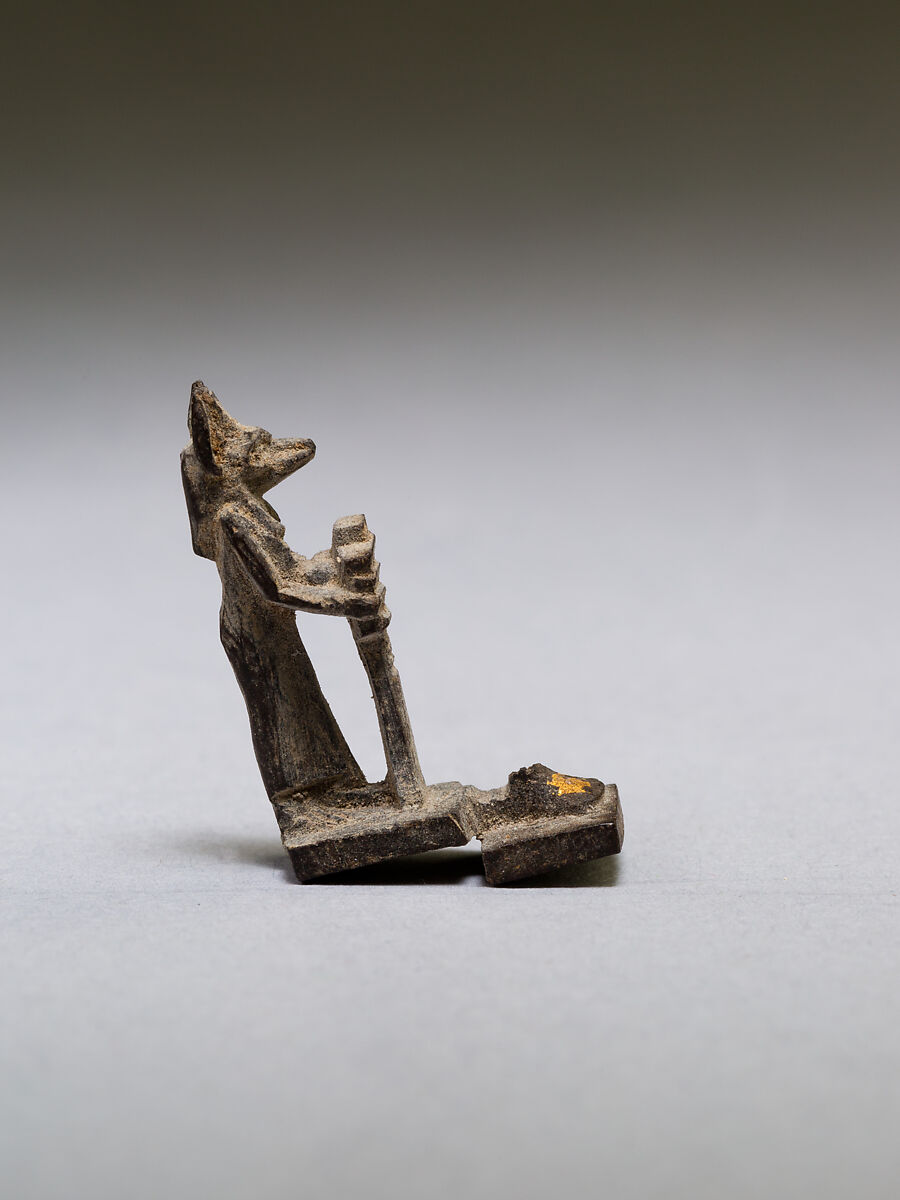 Anubis (?) supporting a large djed pillar, wood