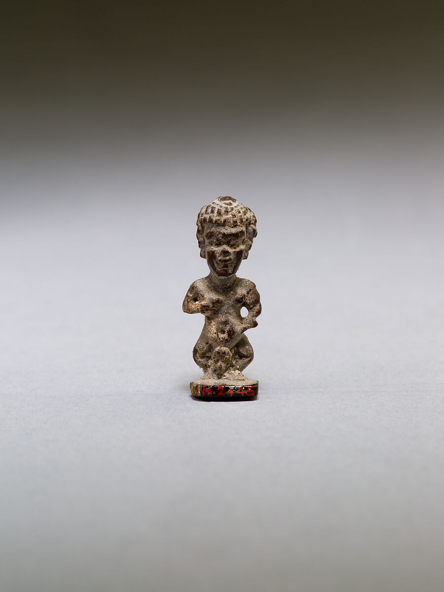 Pataikos or other dwarf god, with curly hair, wood 