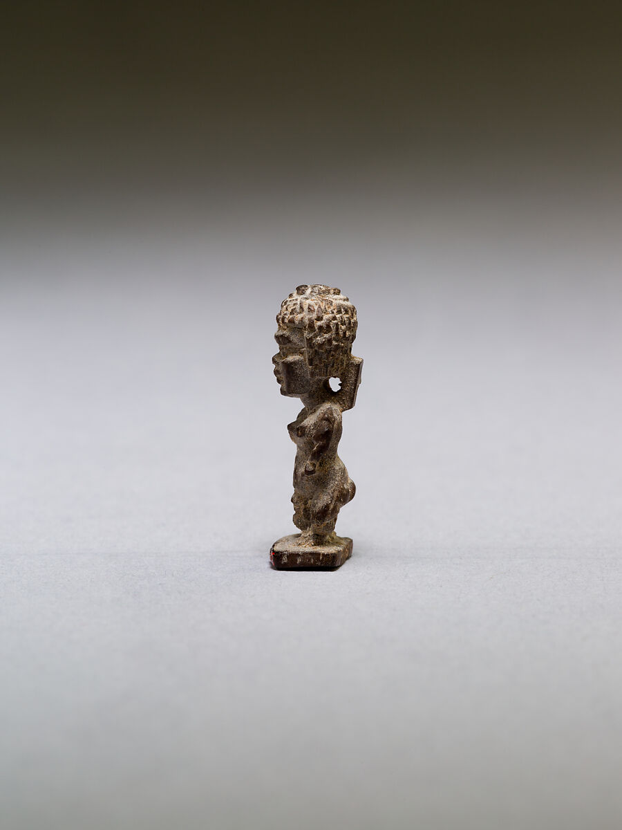 Pataikos or other dwarf god, with curly hair, wood