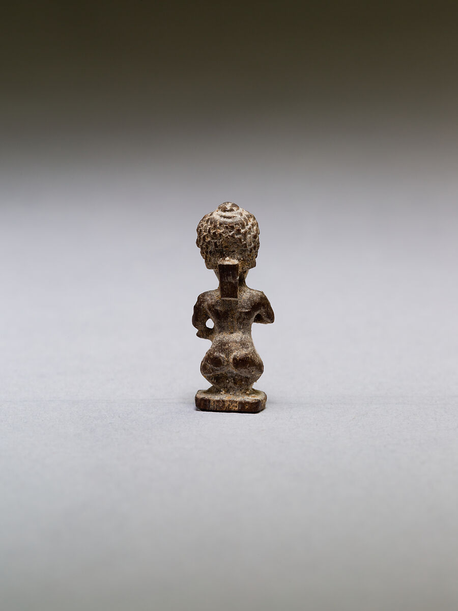 Pataikos or other dwarf god, with curly hair, wood