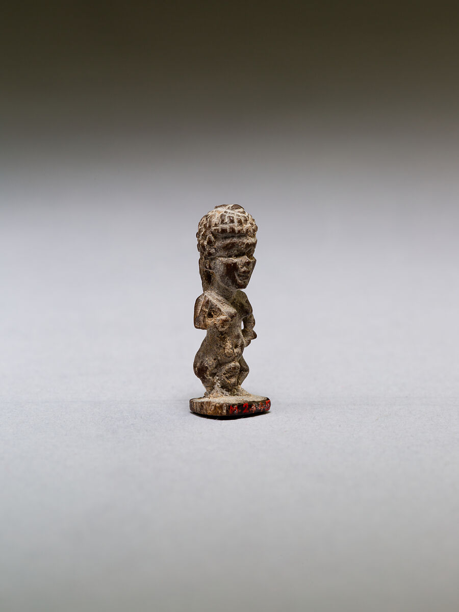 Pataikos or other dwarf god, with curly hair, wood