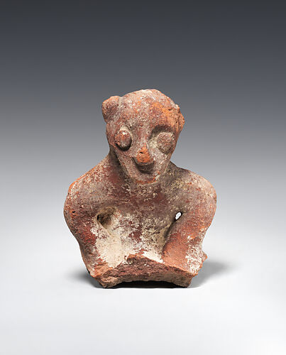 Head and torso of a male figure