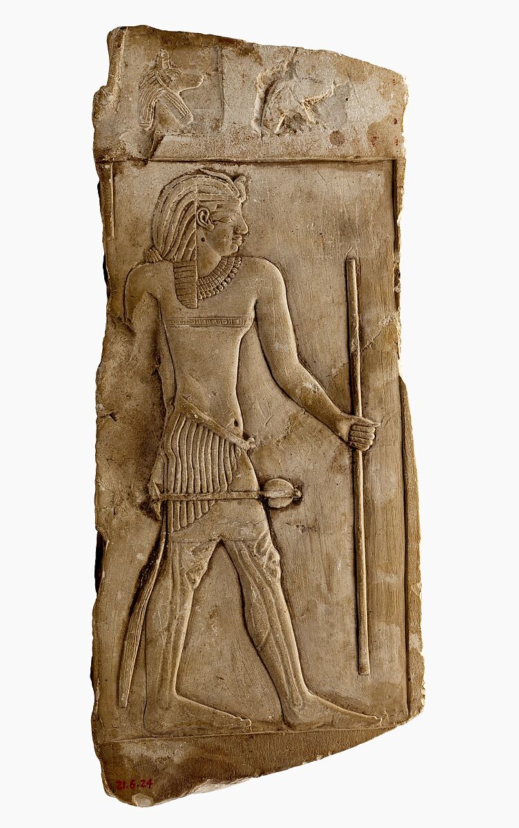 Sculptor's model/votive depicting a king and jackal busts, Limestone, red paint traces