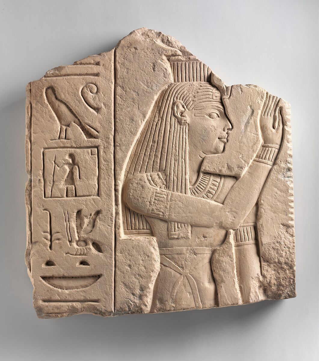 Relief of a goddess offering a palm rib, Limestone 