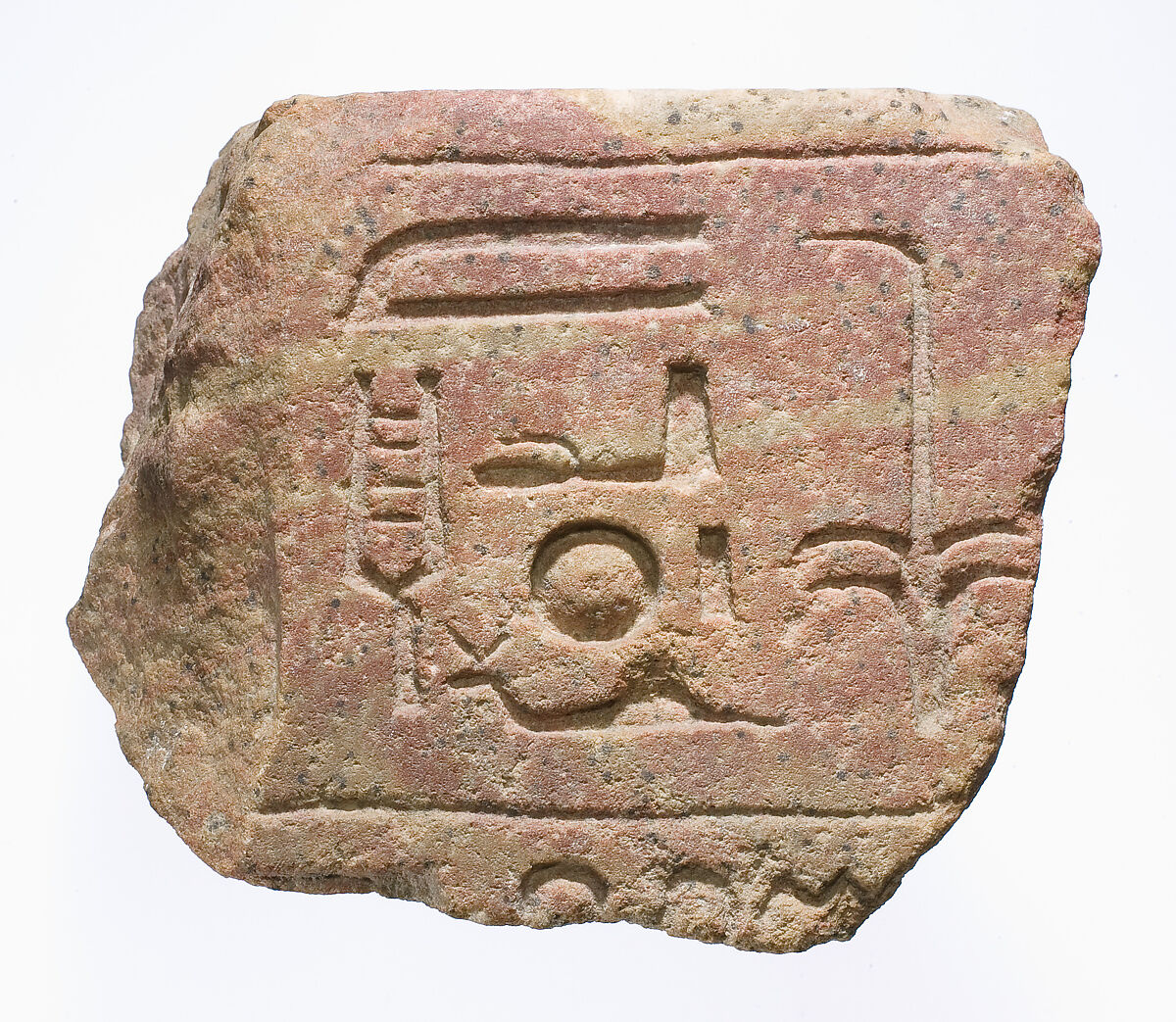 Block fragment inscribed with epithets of the king, red/yellow quartzite 