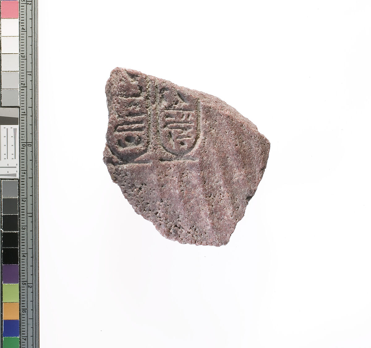 relief (?) chest with pleats and Aten cartouches, Red quartzite