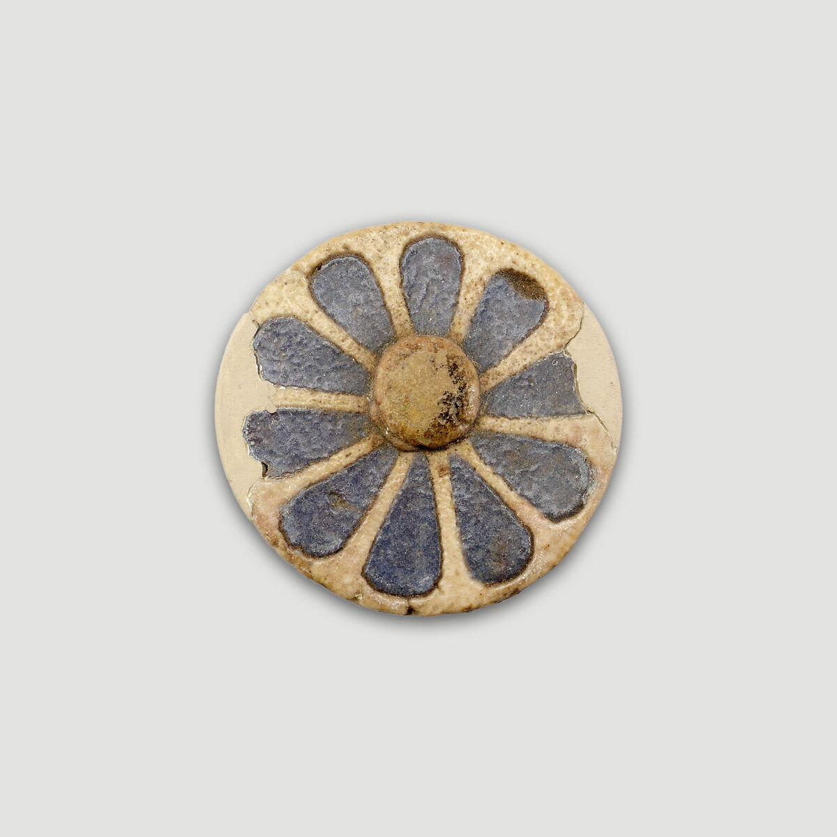 Glazed disk in the shape of rosette, Faience 