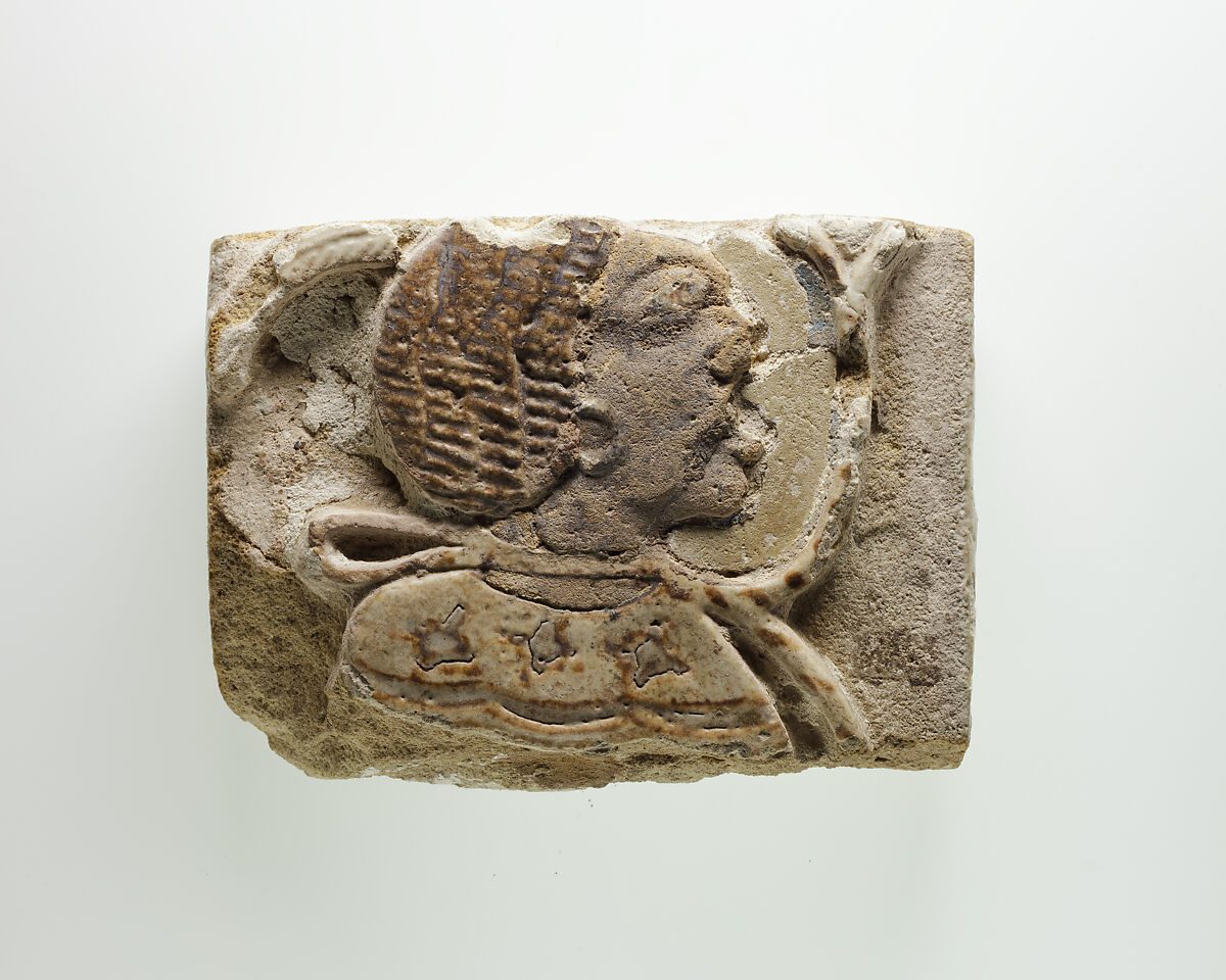 Tile fragment with a head of a prisoner, Faience 