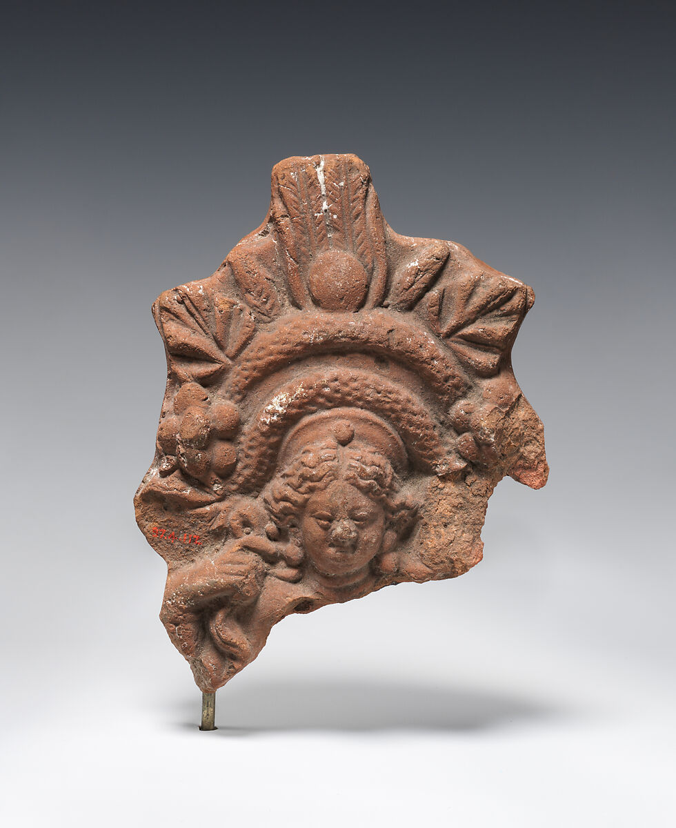 Figurine with elaborate headdress, Terracotta 
