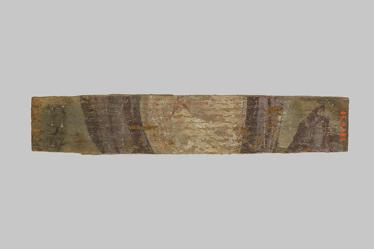 Fragment of a mummy label, Wood, pigment 