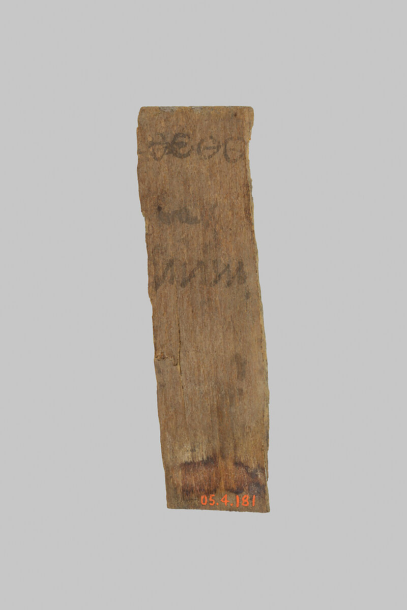 Fragment of a mummy label, Wood, ink