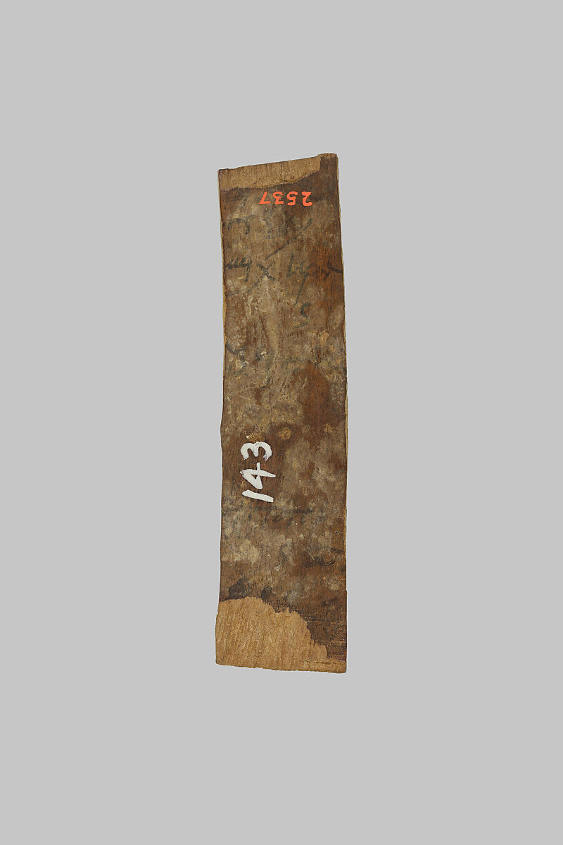 Fragment of a mummy label, Wood, ink