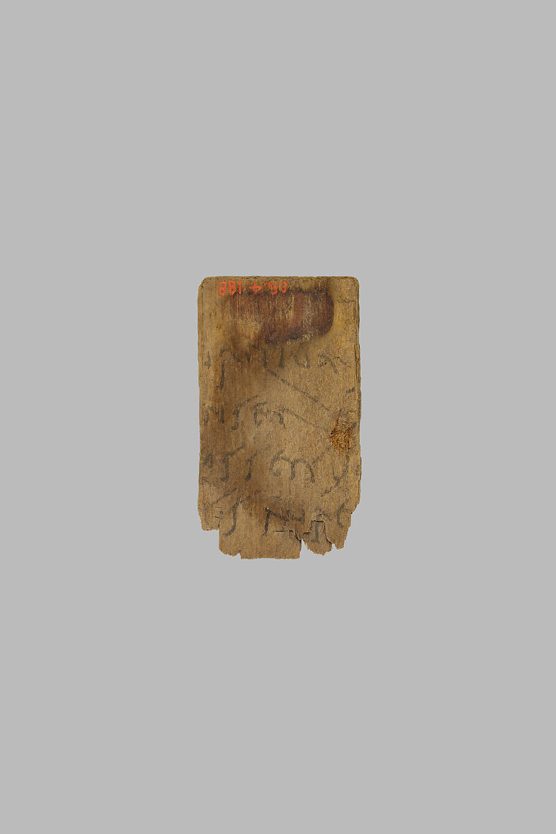 Fragment of a mummy label, Wood, ink 