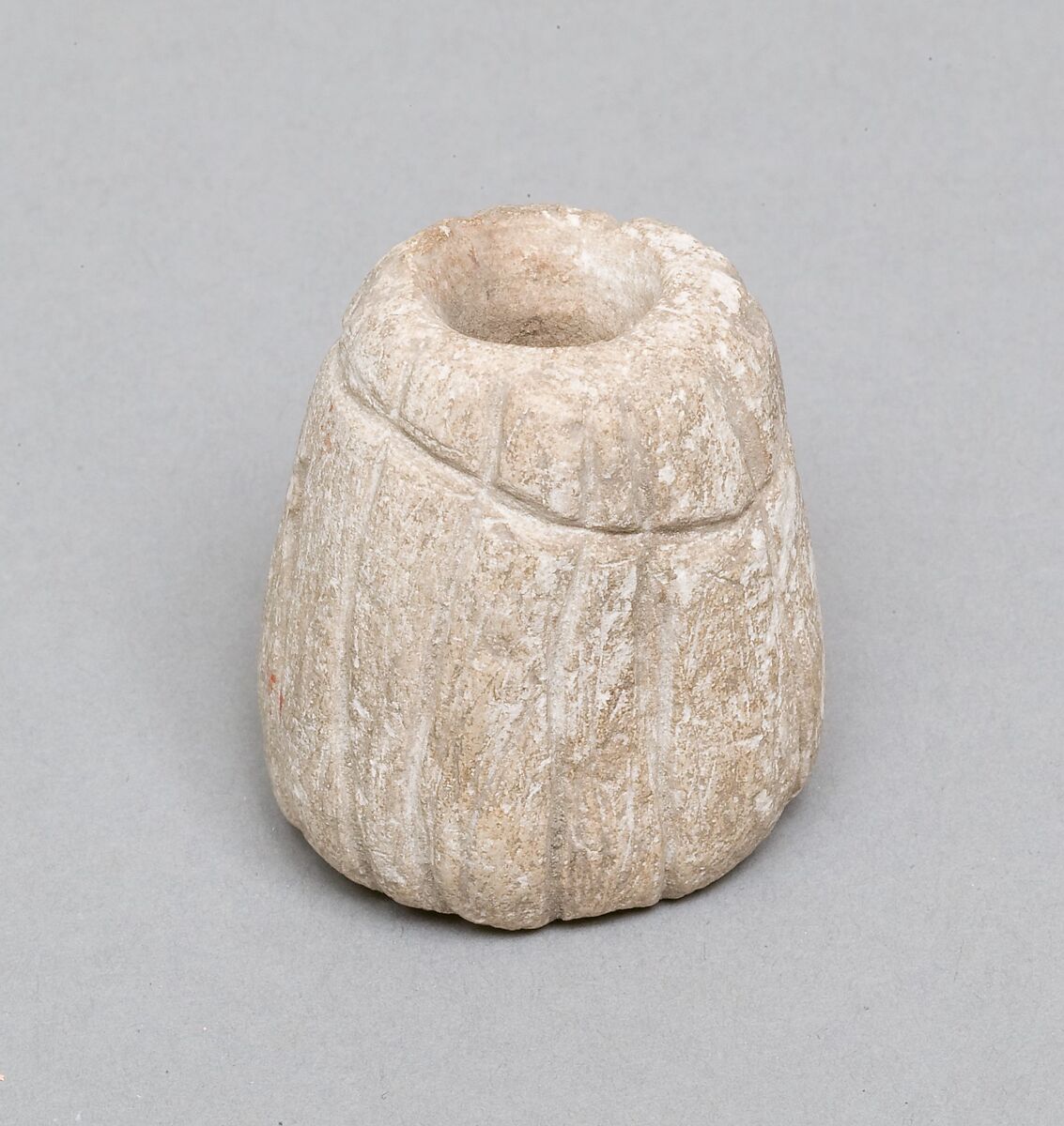 Spindle whorl, Limestone 