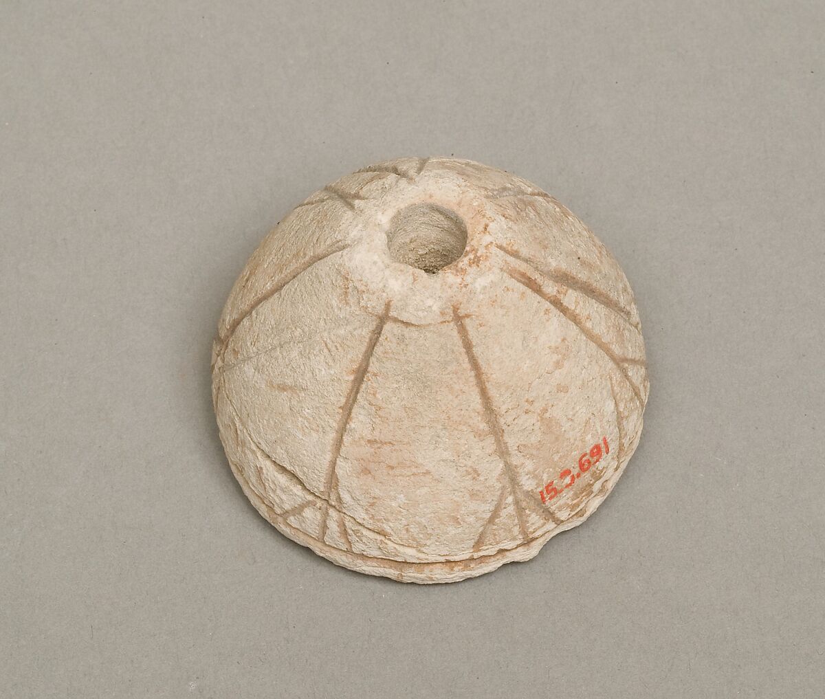 Spindle whorl, Limestone 