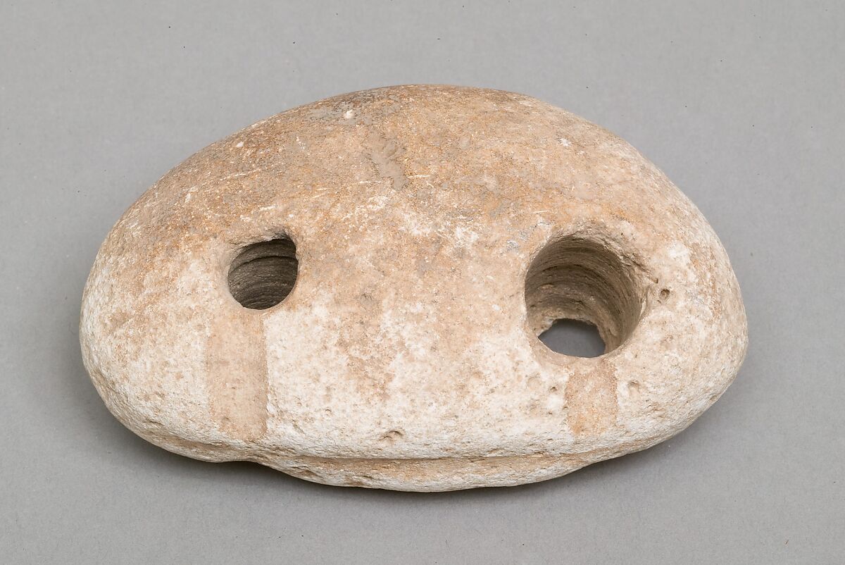 Weighing down device (fish net sinker?), Limestone 