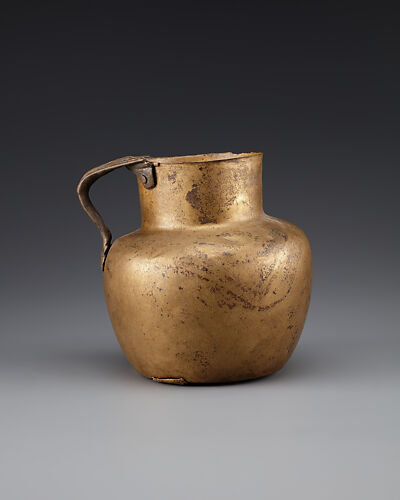 Jug with lotus handle