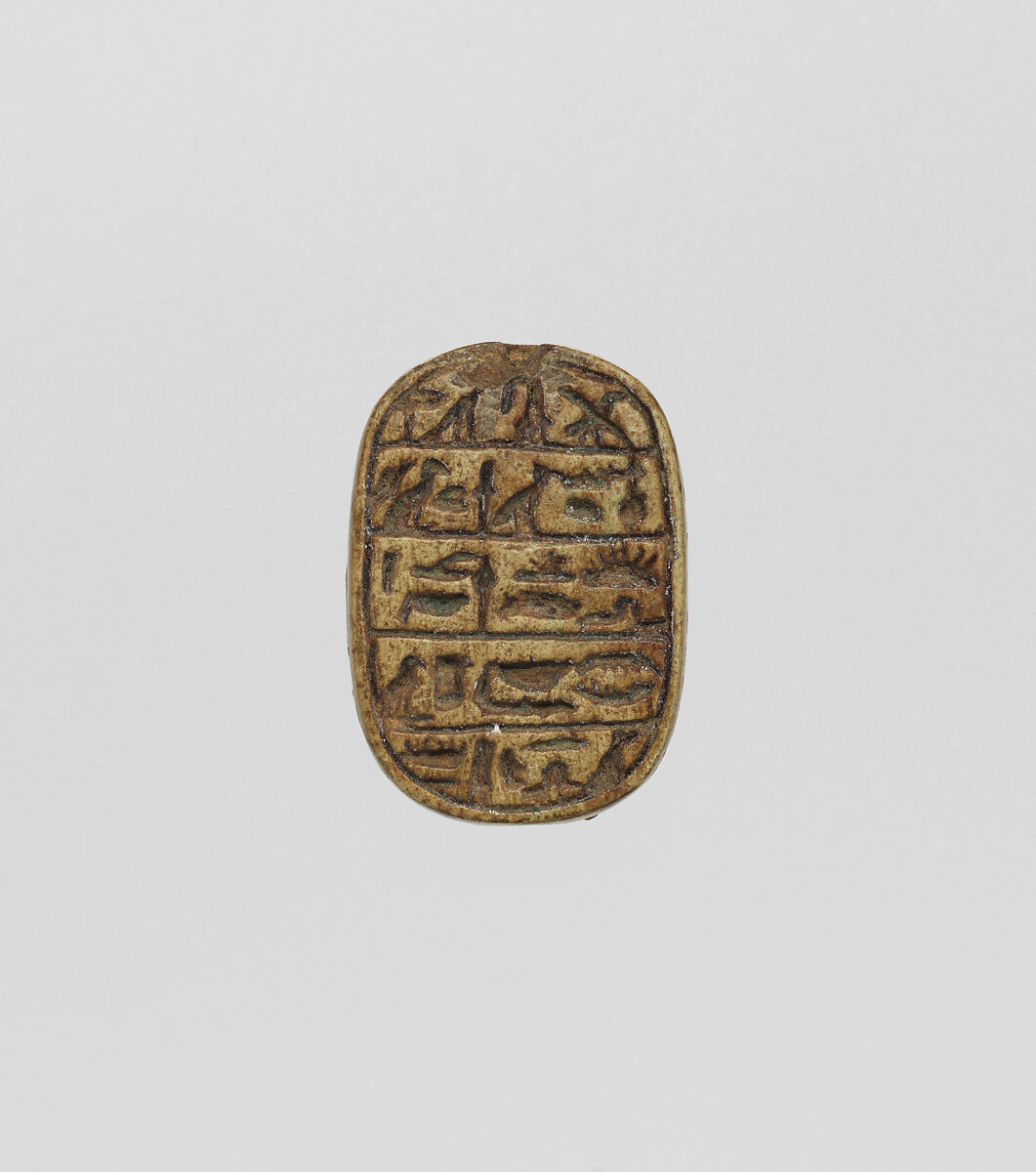 Plaque with Hathor, Mistress of Iwnw on one side, text on opposite side, Steatite