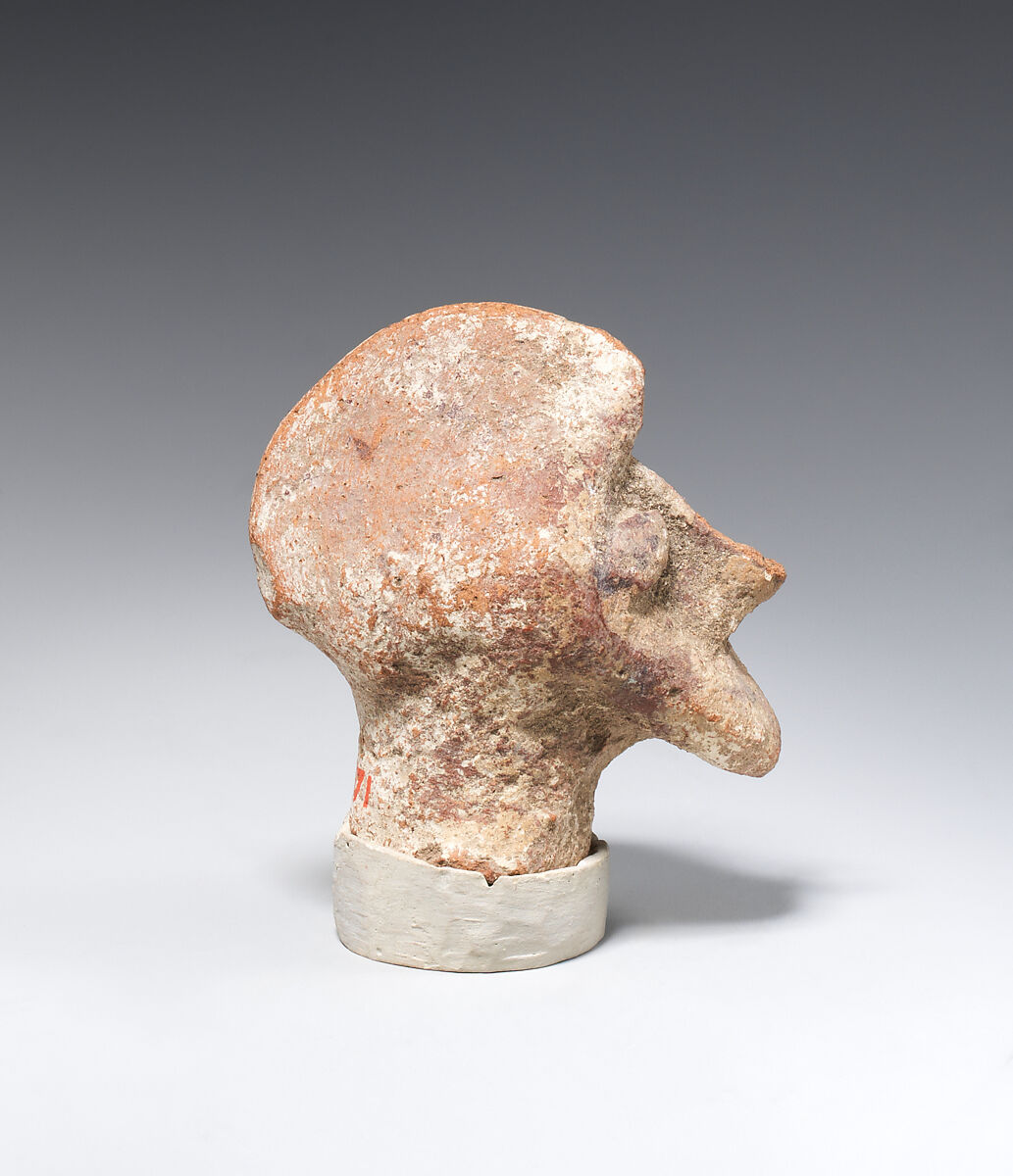 Head from a figurine, Pottery; paint