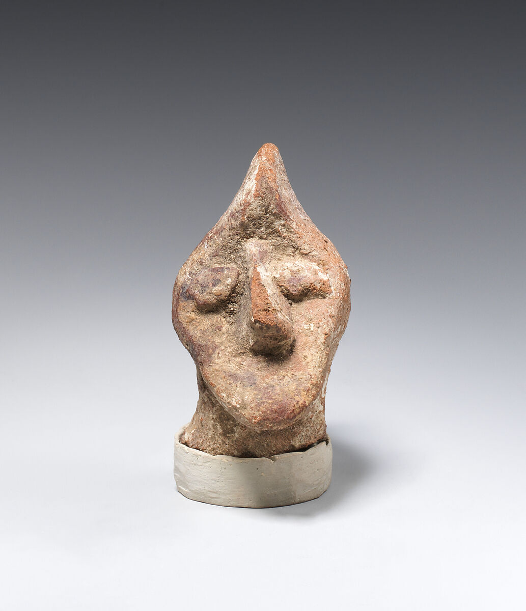 Head from a figurine, Pottery; paint