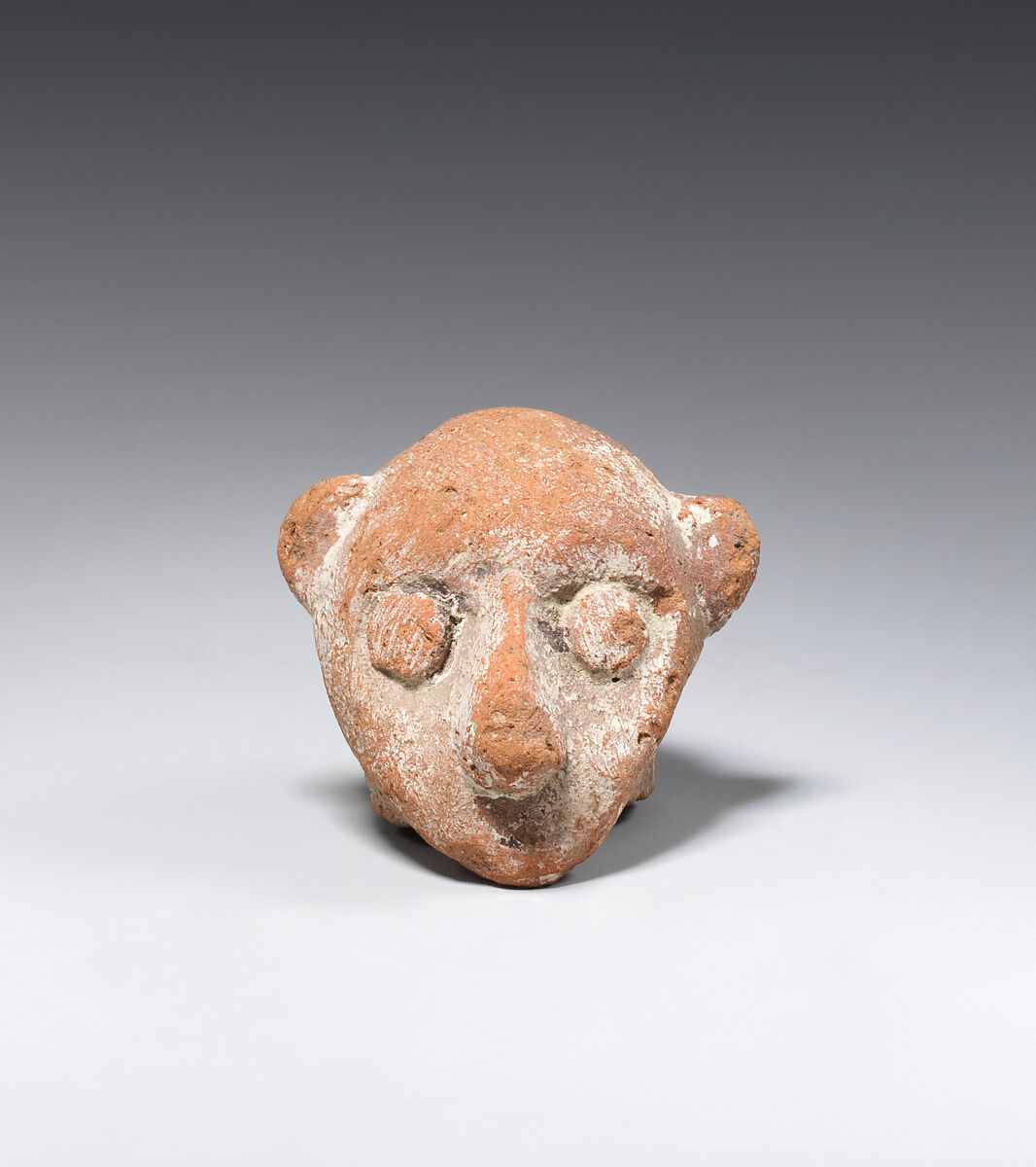 Head of a male figure, Pottery; paint 