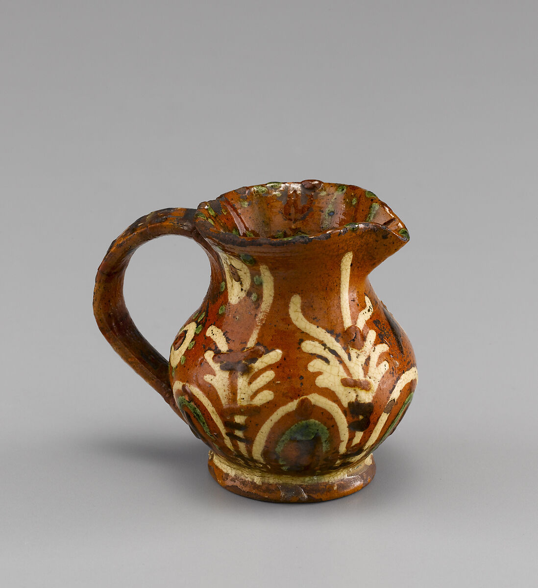 Cream jug, Earthenware with slip decoration, American 