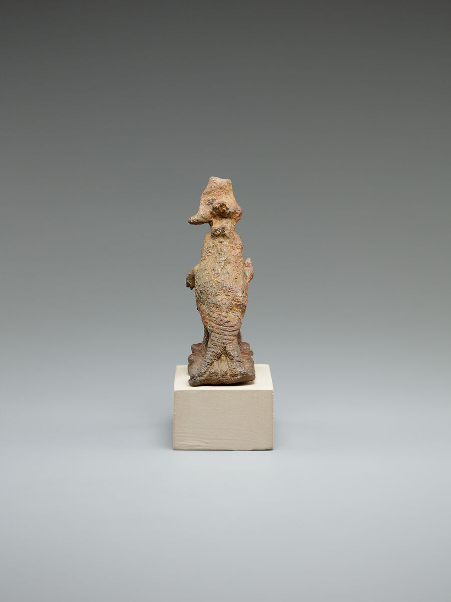 Ithyphallic falcon treading on two snakes, cupreous alloy