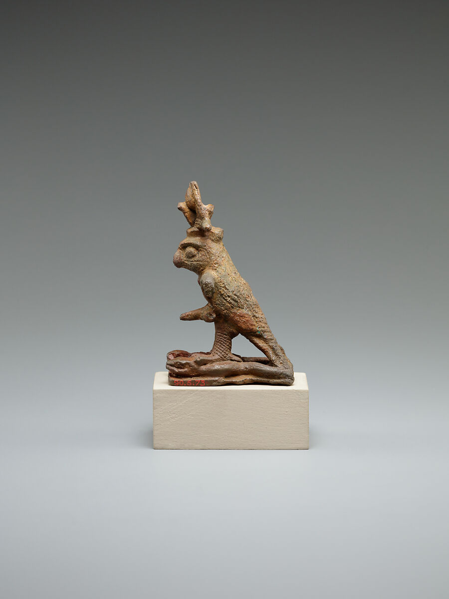 Ithyphallic falcon treading on two snakes, cupreous alloy