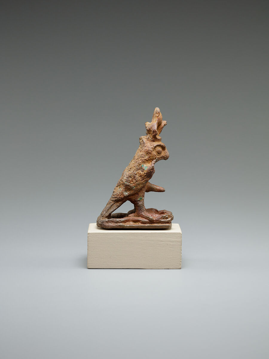 Ithyphallic falcon treading on two snakes, cupreous alloy