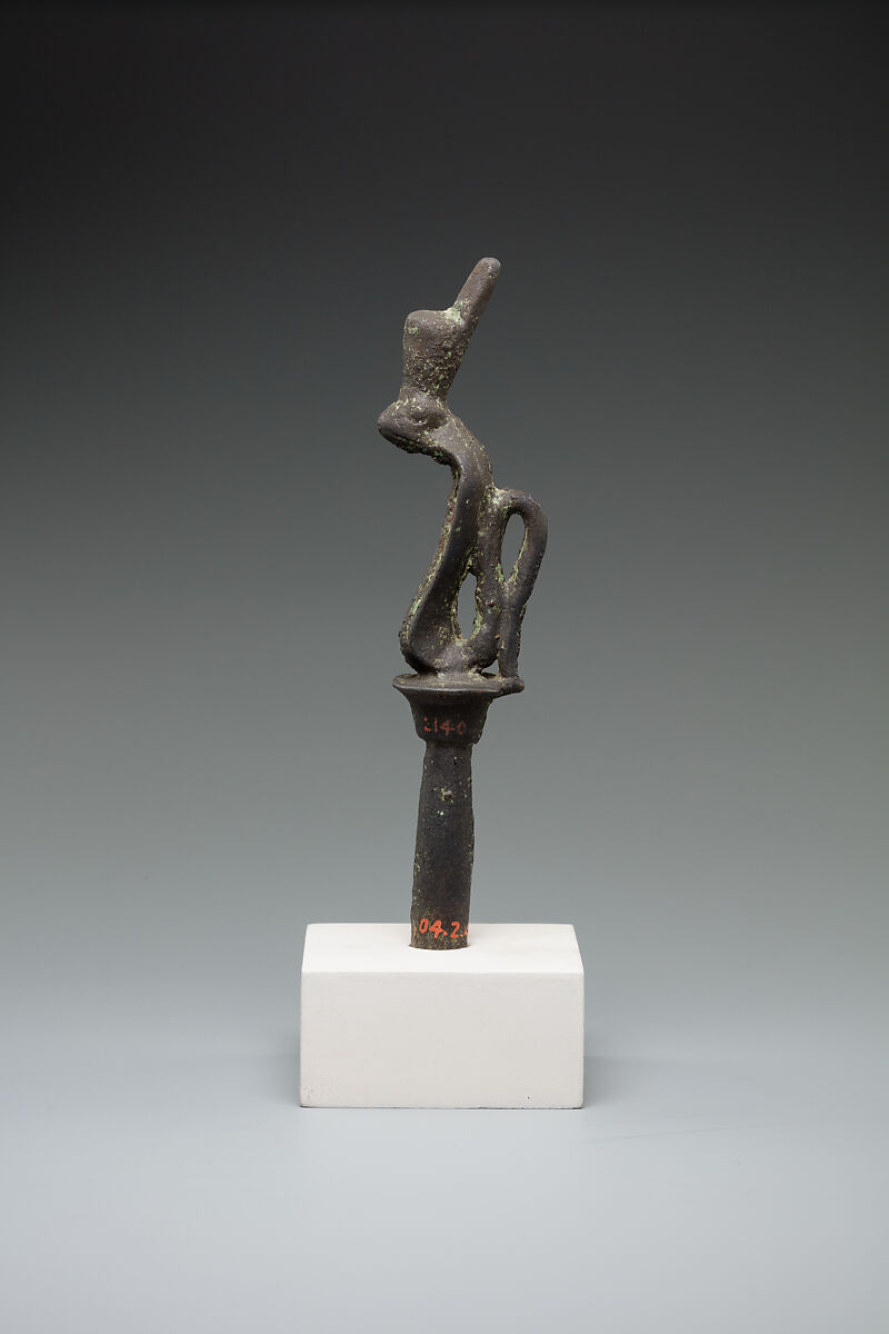 Cobra wearing red crown on a papyrus stem, Bronze or cupreous alloy