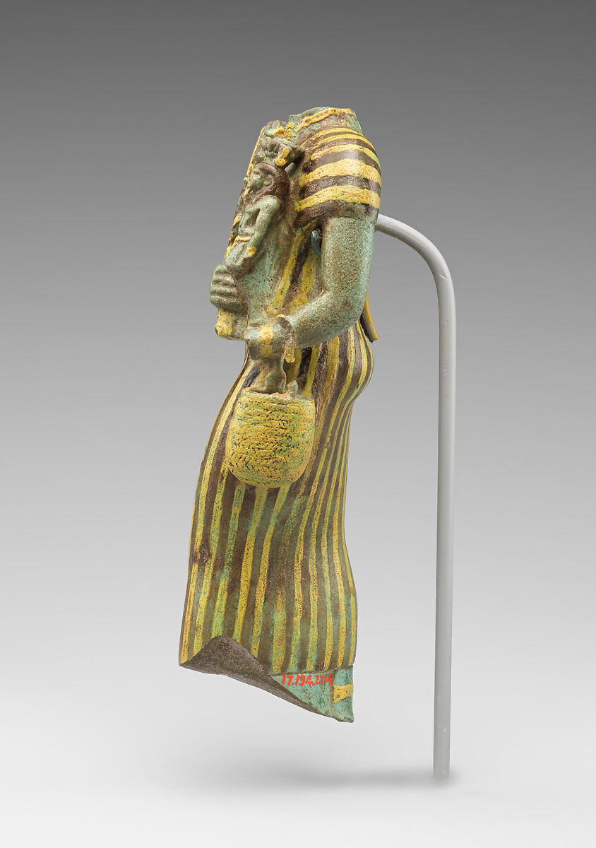Statuette of Bastet holding a figure of Nefertum, Faience