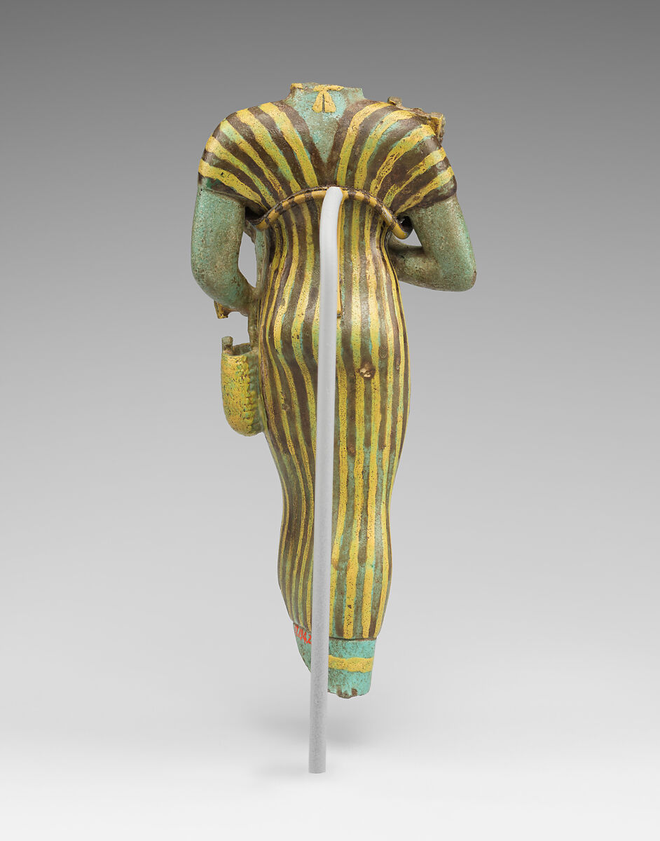 Statuette of Bastet holding a figure of Nefertum, Faience