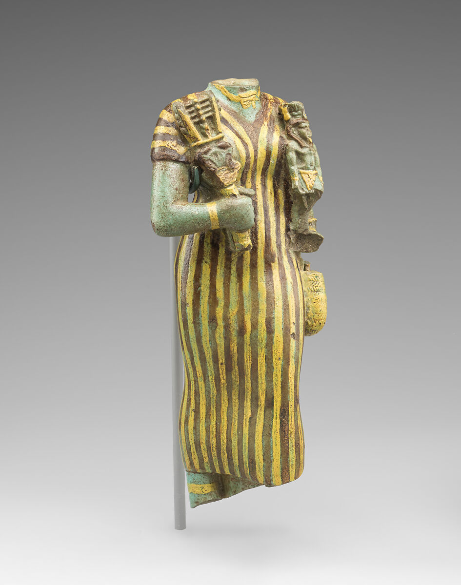 Statuette of Bastet holding a figure of Nefertum, Faience